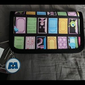 BNWT and charms- monsters inc wallet